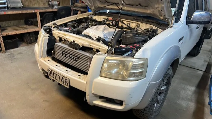 Fault-finding under the bonnet of a Ford Ranger at the workshop